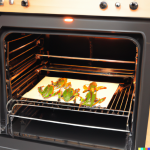 DALL·E 2023-01-10 05.37.04 - Frogs jump out of the oven.png